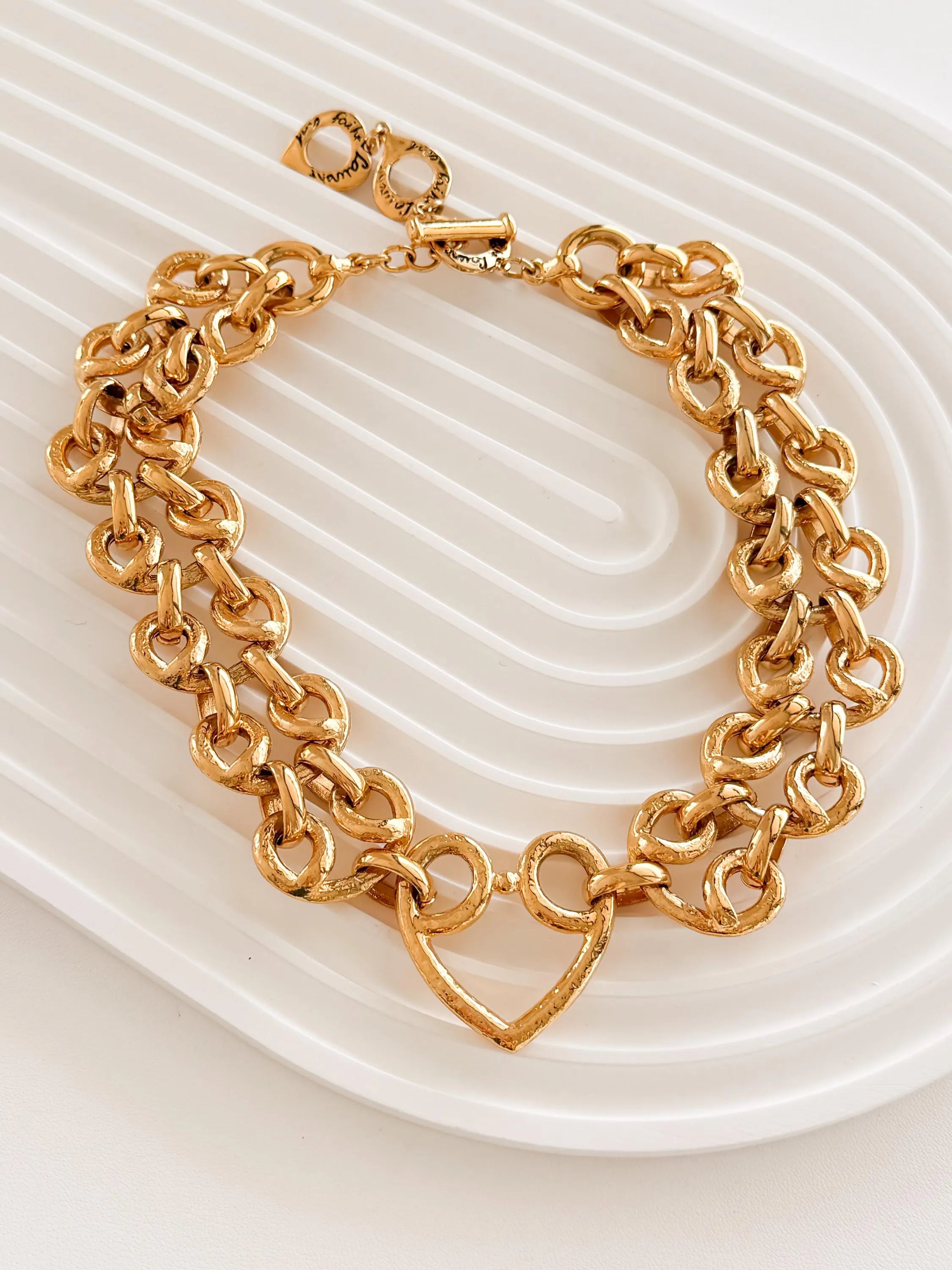 Vintage Yves Saint Laurent gold bold chain necklace with heart centerpiece
