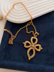 Vintage Yves Saint Laurent gold tone openwork cross pendant long necklace elegant design