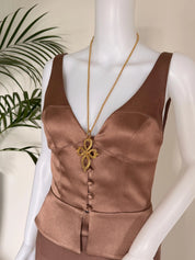 Vintage YSL cross pendant long necklace worn as luxury opera length statement