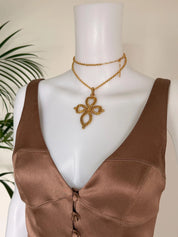 Authentic Vintage YSL Yves Saint Laurent gold openwork cross pendant long necklace opera length