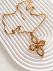 Vintage YSL textured gold cross pendant necklace sculptural openwork design