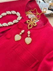 Vintage YSL Yves Saint Laurent gold pave crystal heart clip-on earrings statement jewelry