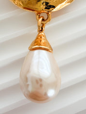 Vintage Yves Saint Laurent gold tone pearl charm dangle brooch elegant statement piece