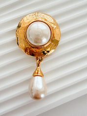 Vintage Yves Saint Laurent gold tone pearl charm dangle brooch elegant statement piece