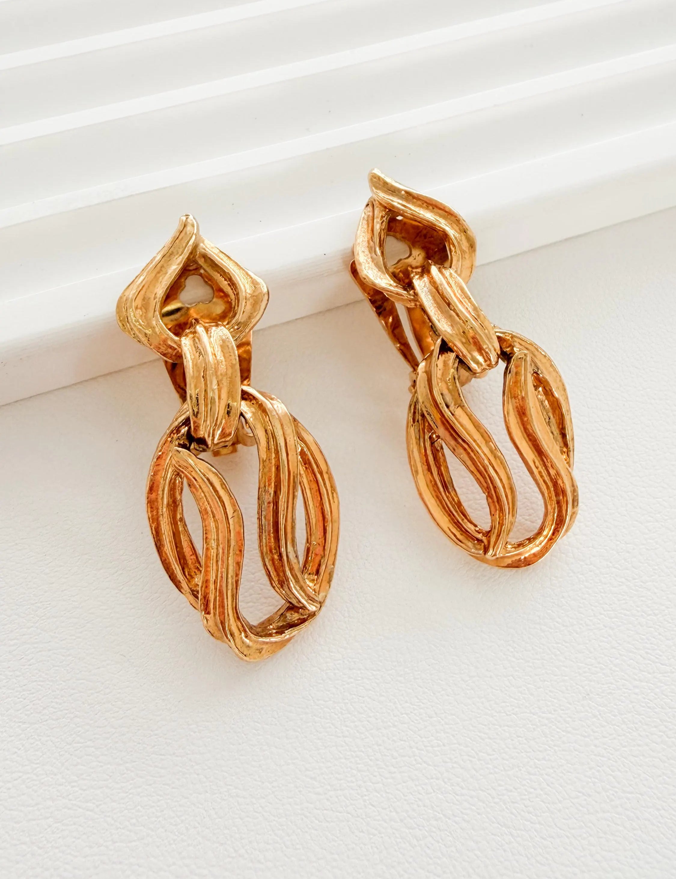 Authentic Vintage YSL Yves Saint Laurent gold sculptural link clip-on dangle earrings iconic statement