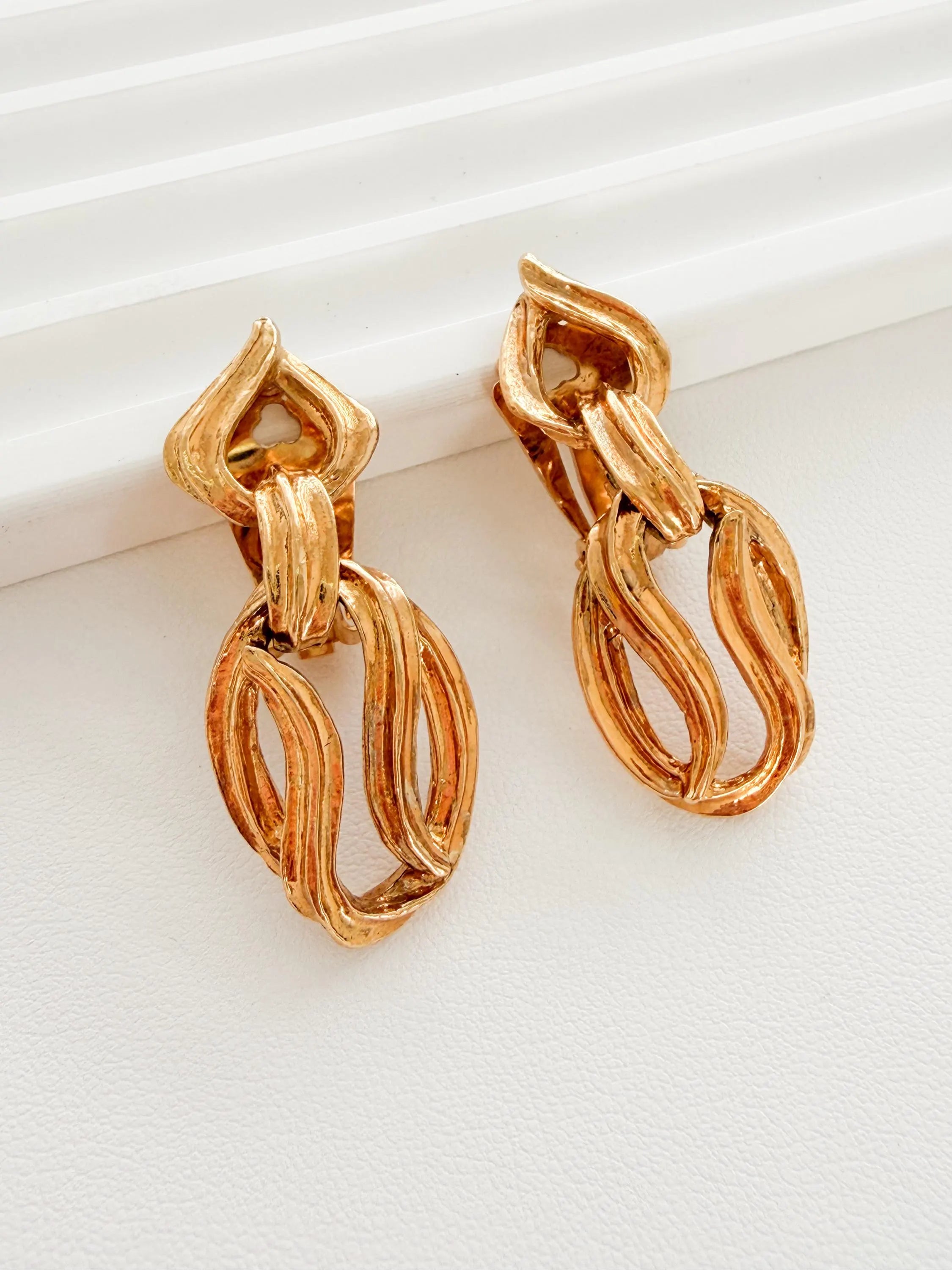 Authentic Vintage YSL Yves Saint Laurent gold sculptural link clip-on dangle earrings iconic statement