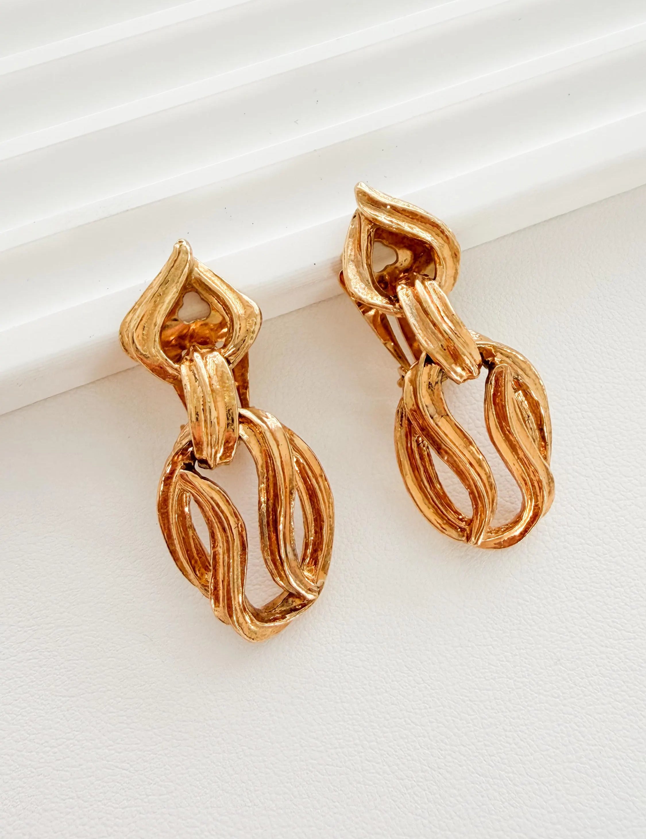 Vintage Yves Saint Laurent gold tone sculptural link clip-on earrings elegant statement jewelry