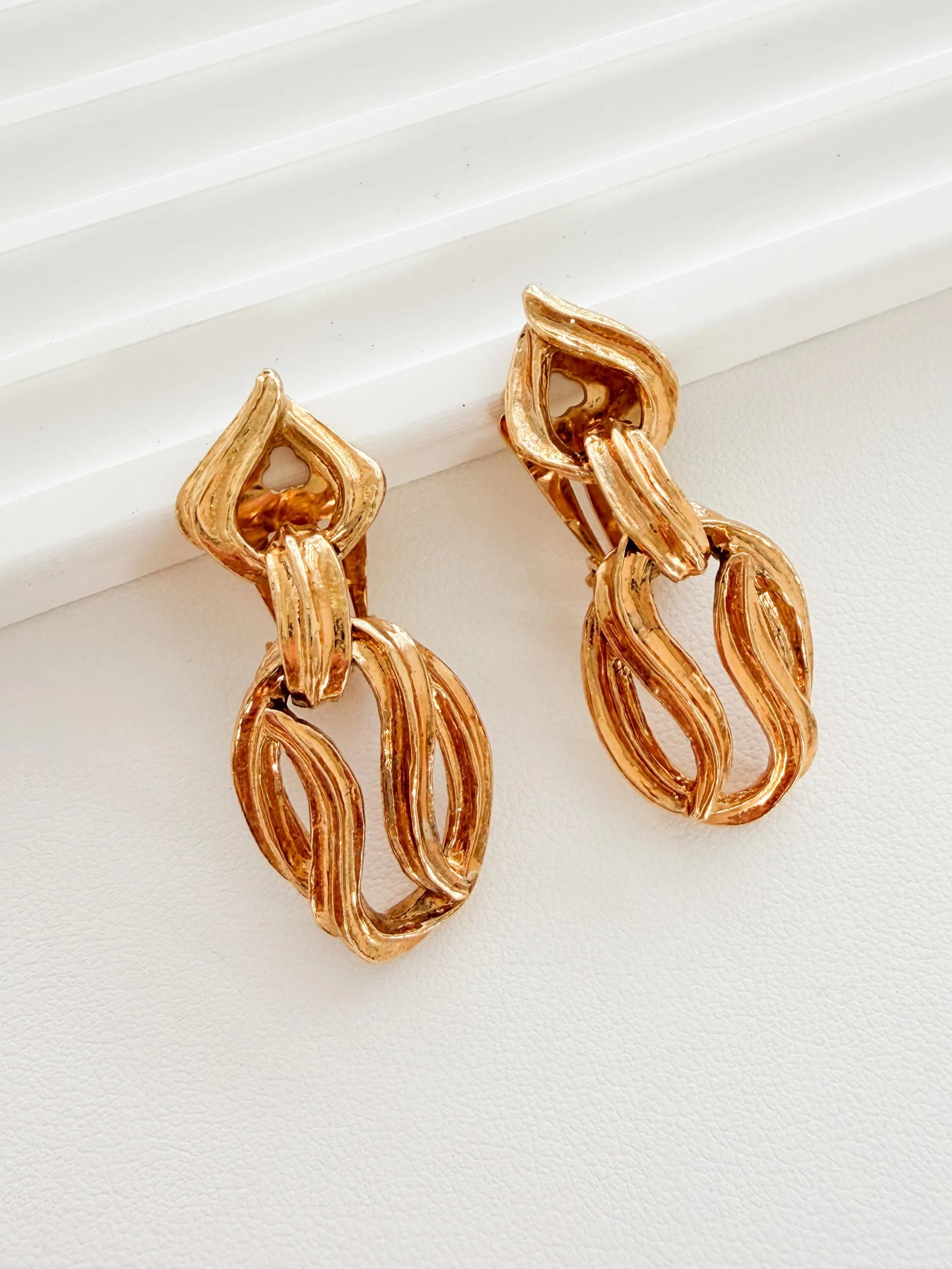 Vintage Yves Saint Laurent gold tone sculptural link clip-on earrings elegant statement jewelry