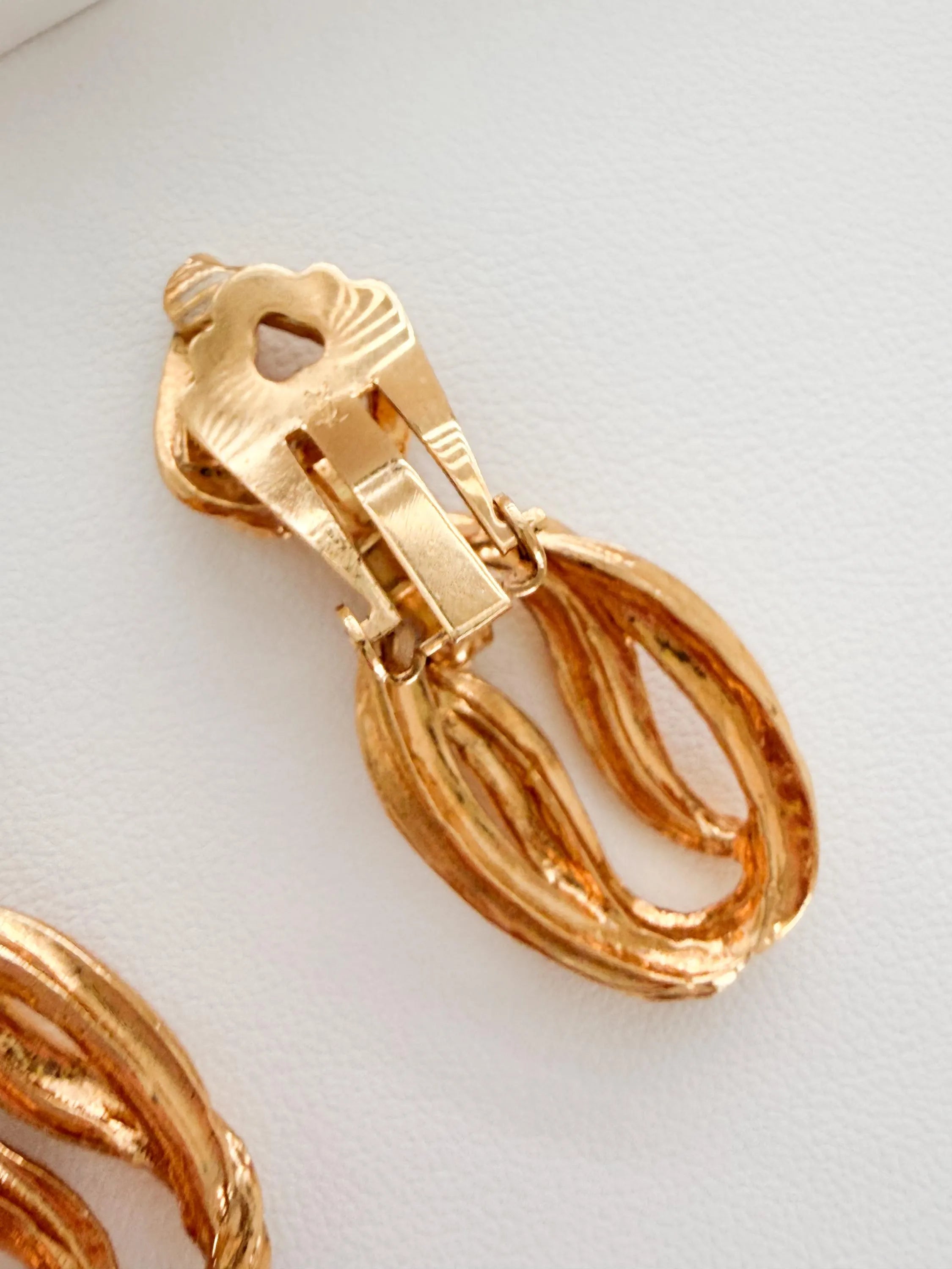Vintage Yves Saint Laurent gold tone sculptural link clip-on earrings elegant statement jewelry