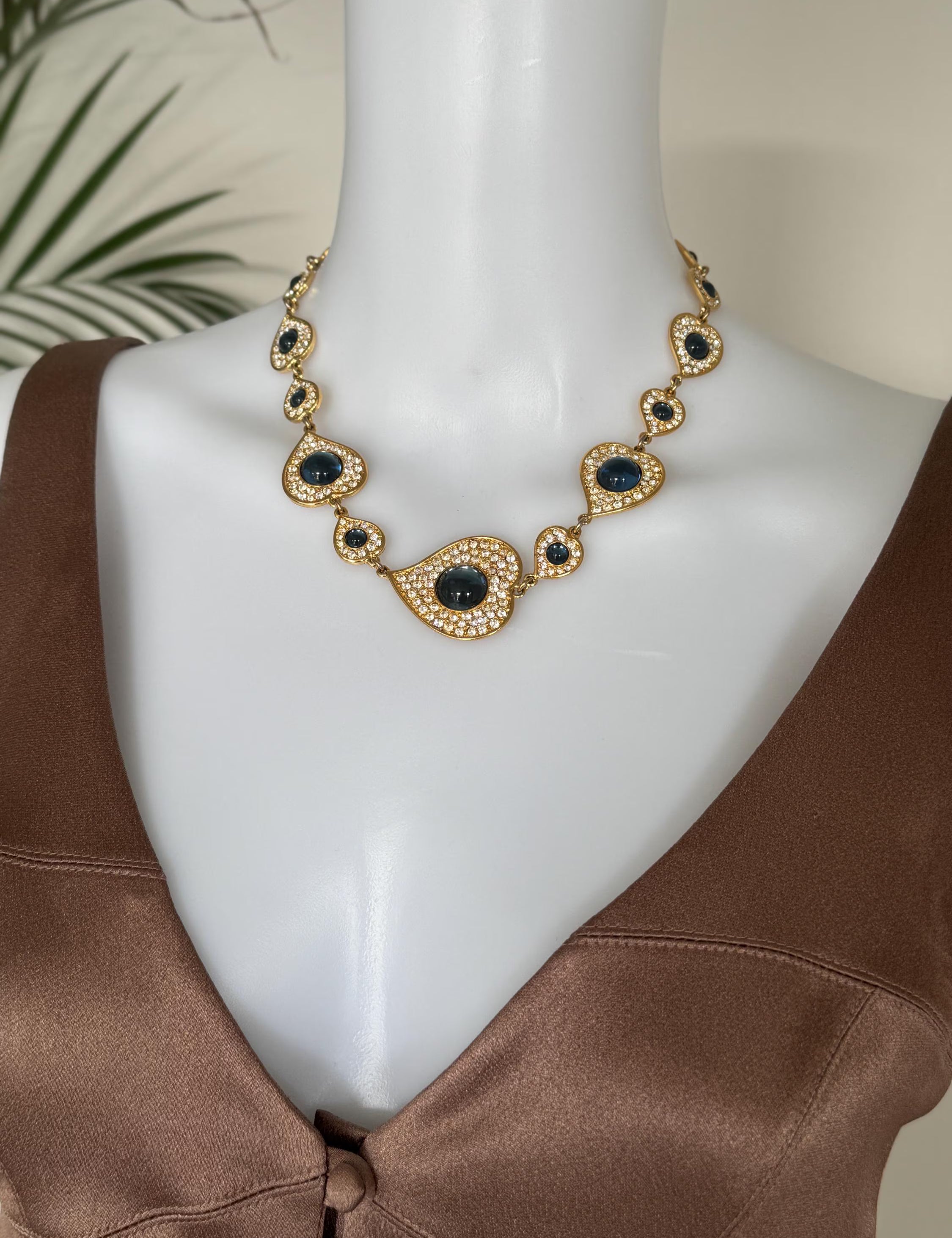 Vintage YSL gold tone heart link necklace with royal blue cabochon and crystals