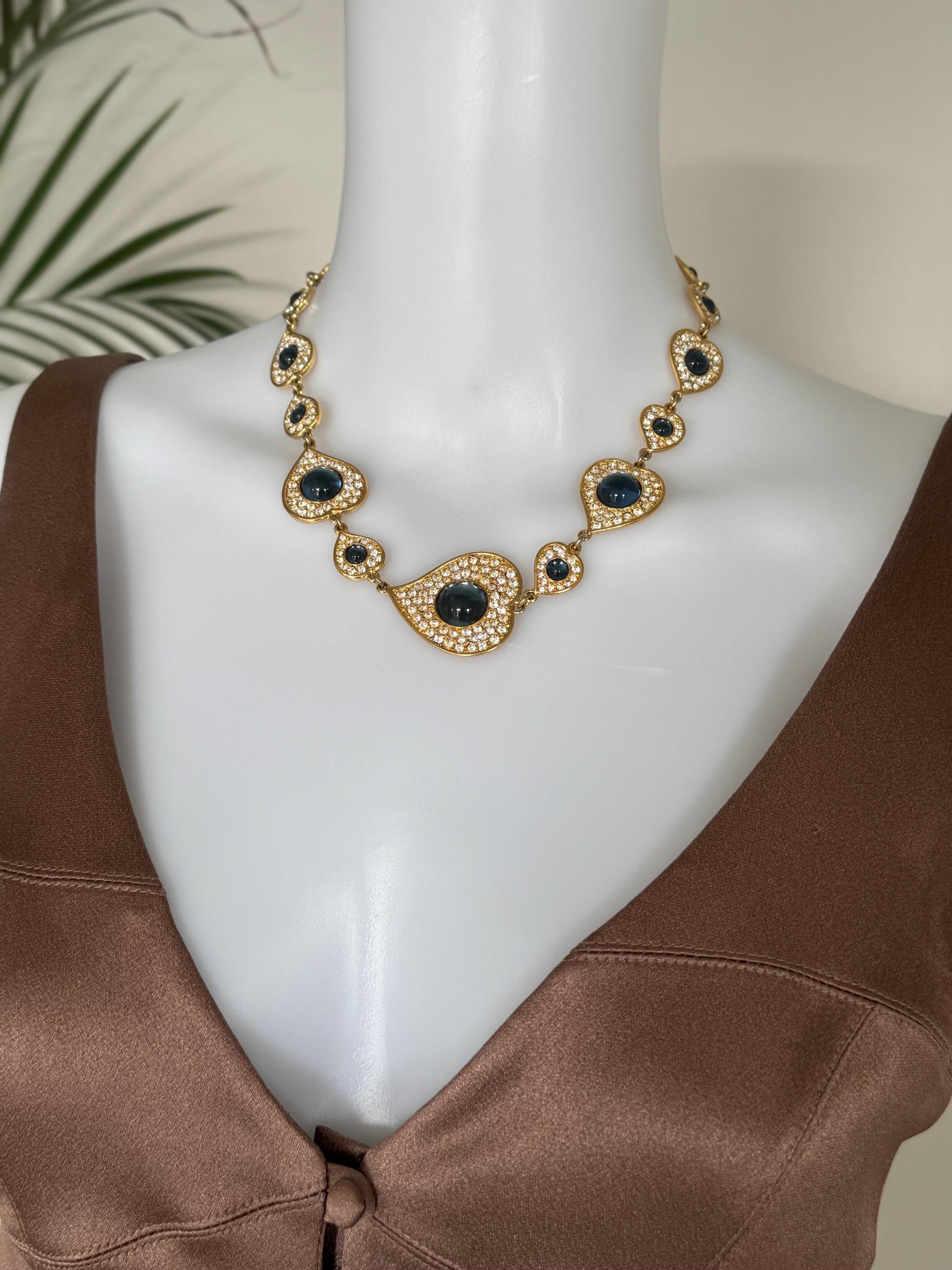 Vintage YSL gold tone heart link necklace with royal blue cabochon and crystals
