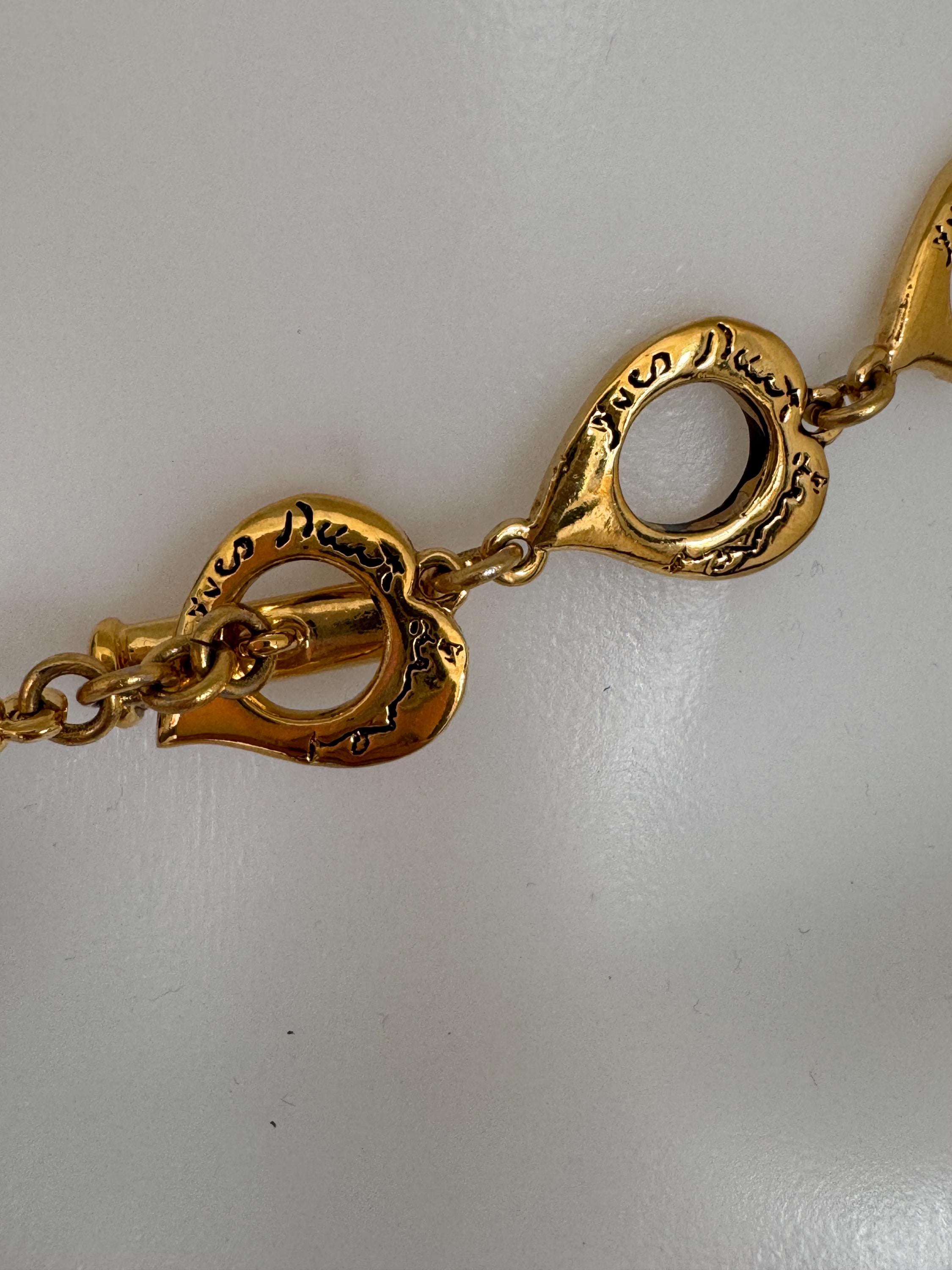 YSL heart signature clasp on vintage gold tone heart necklace