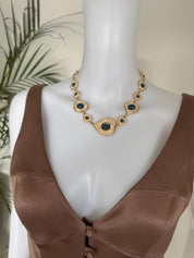 Vintage YSL Yves Saint Laurent heart necklace with blue cabochon and crystal accents in gold tone