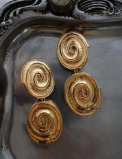 Vintage YSL Yves Saint Laurent spiral clip-on dangle earrings in gold tone