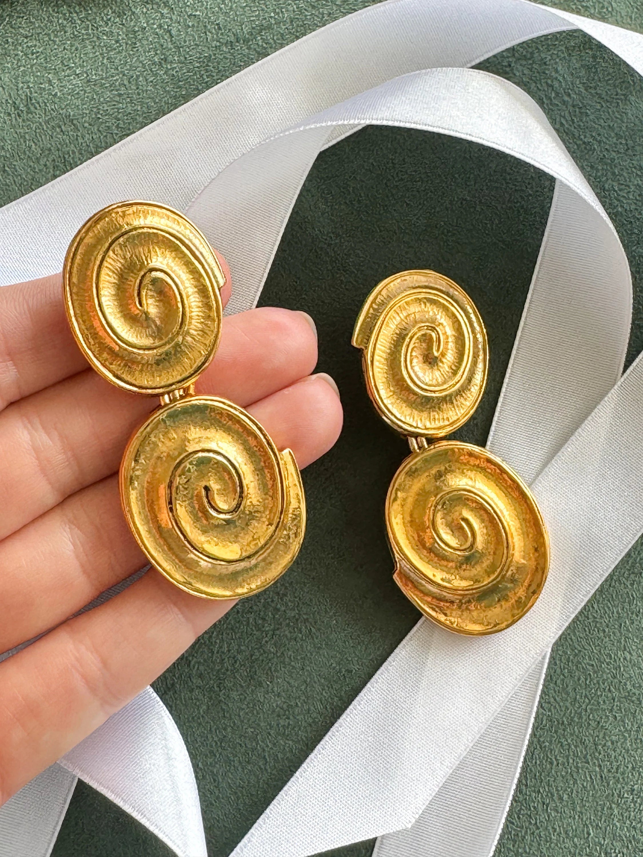 Vintage YSL gold tone spiral clip-on dangle earrings with massive statement design