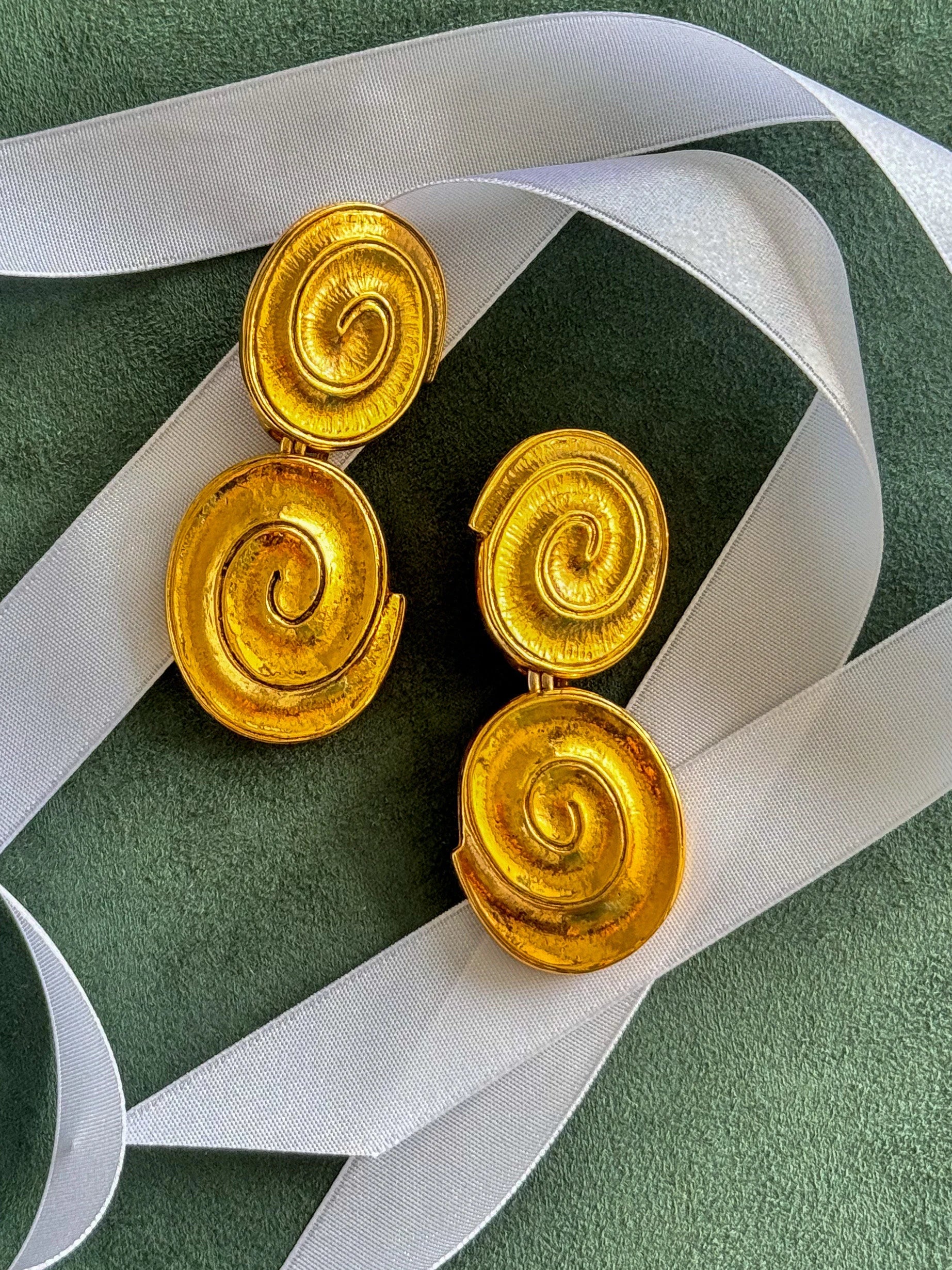 Vintage YSL gold tone spiral clip-on dangle earrings with massive statement design