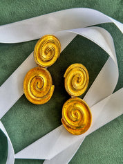 Vintage YSL gold tone spiral clip-on dangle earrings with massive statement design