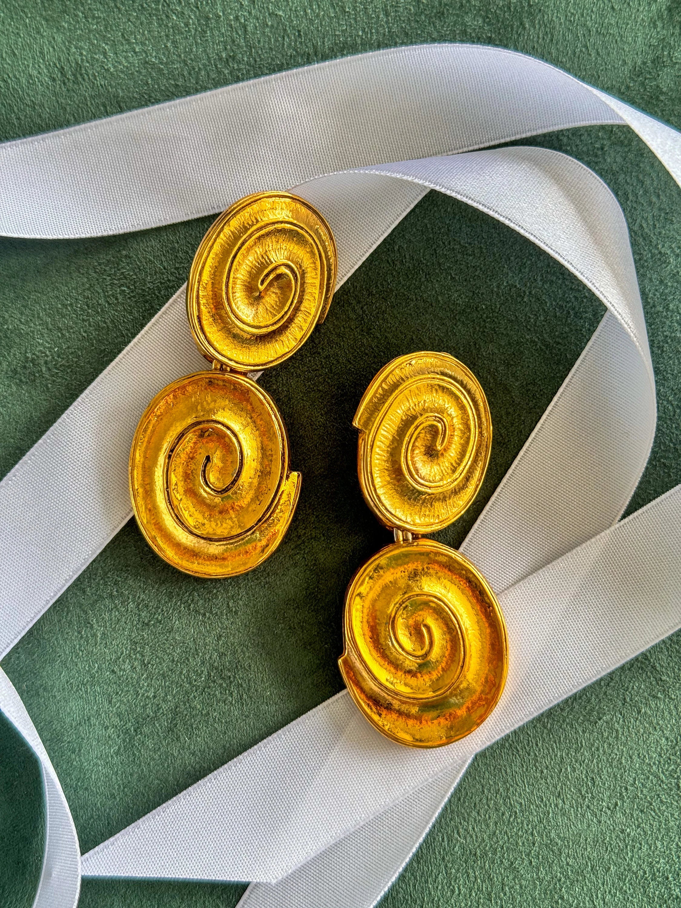 Vintage YSL gold tone spiral clip-on dangle earrings with massive statement design