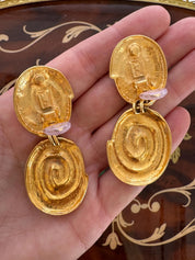 Vintage YSL gold tone spiral clip-on dangle earrings with massive statement design