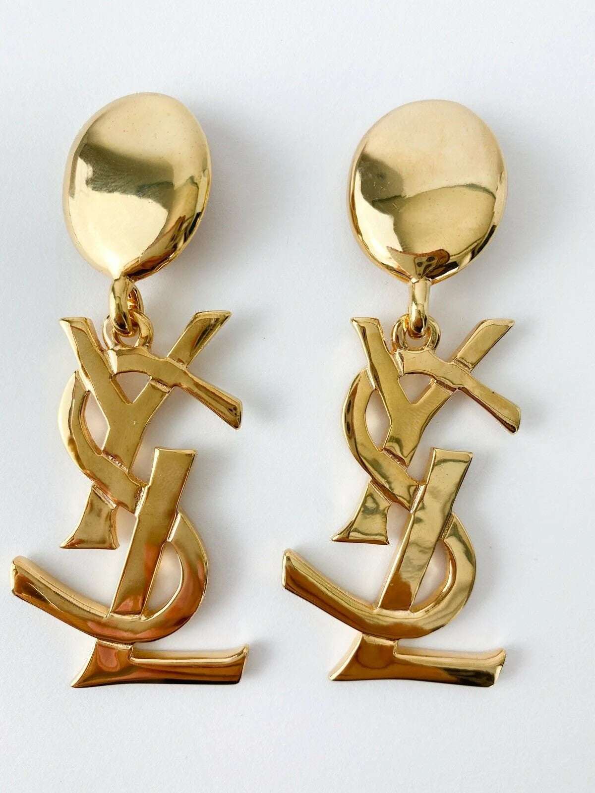 Authentic YSL Yves Saint Laurent vintage gold tone iconic logo drop earrings, made in France, extremely rare collector piece