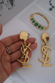 Authentic YSL Yves Saint Laurent vintage gold tone iconic logo drop earrings, made in France, extremely rare collector piece