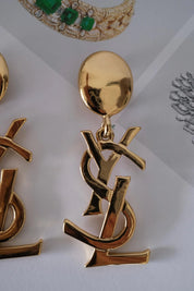 Authentic YSL Yves Saint Laurent vintage gold tone iconic logo drop earrings, made in France, extremely rare collector piece