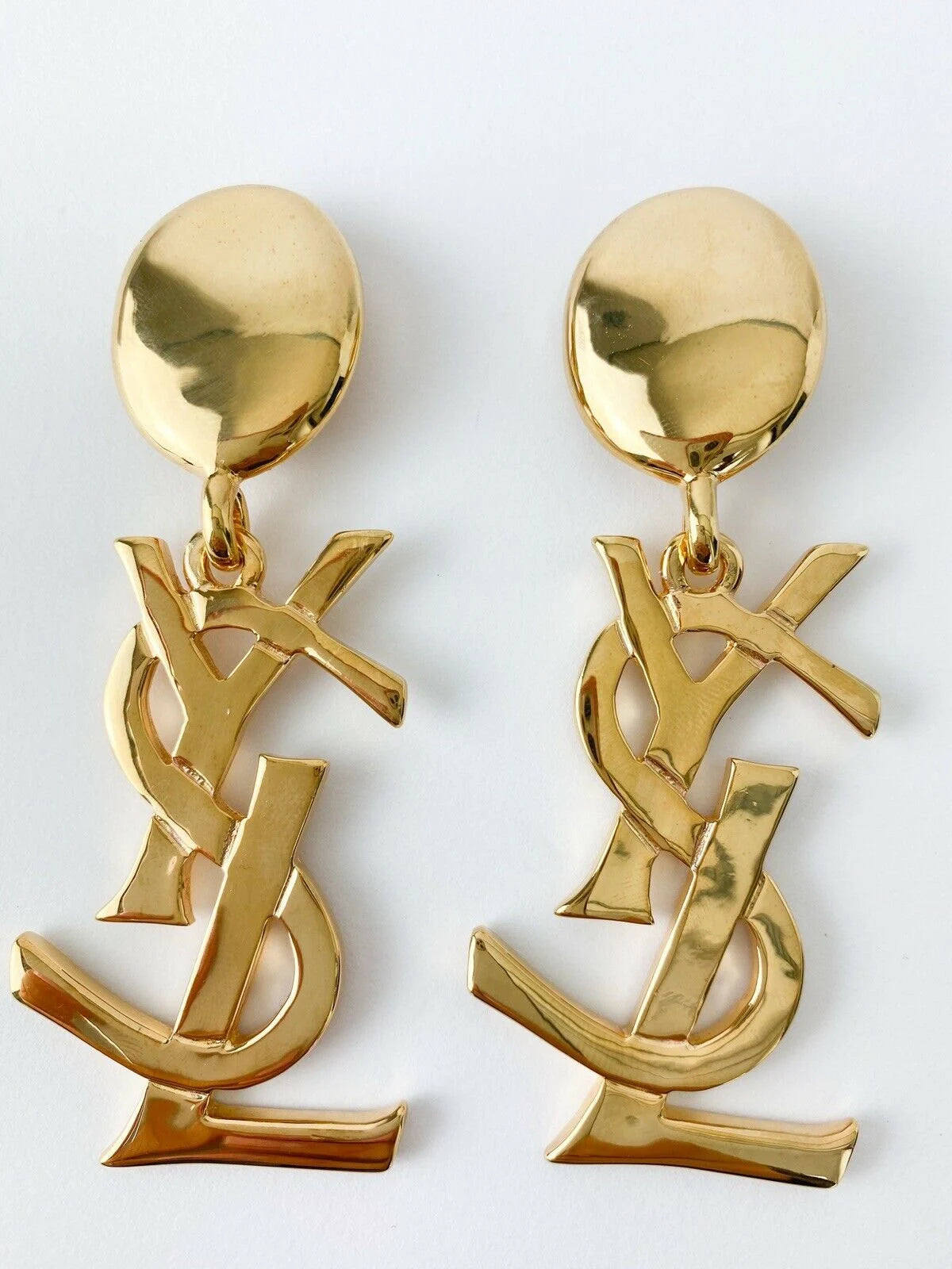 Authentic YSL Yves Saint Laurent vintage gold tone iconic logo drop earrings, made in France, extremely rare collector piece