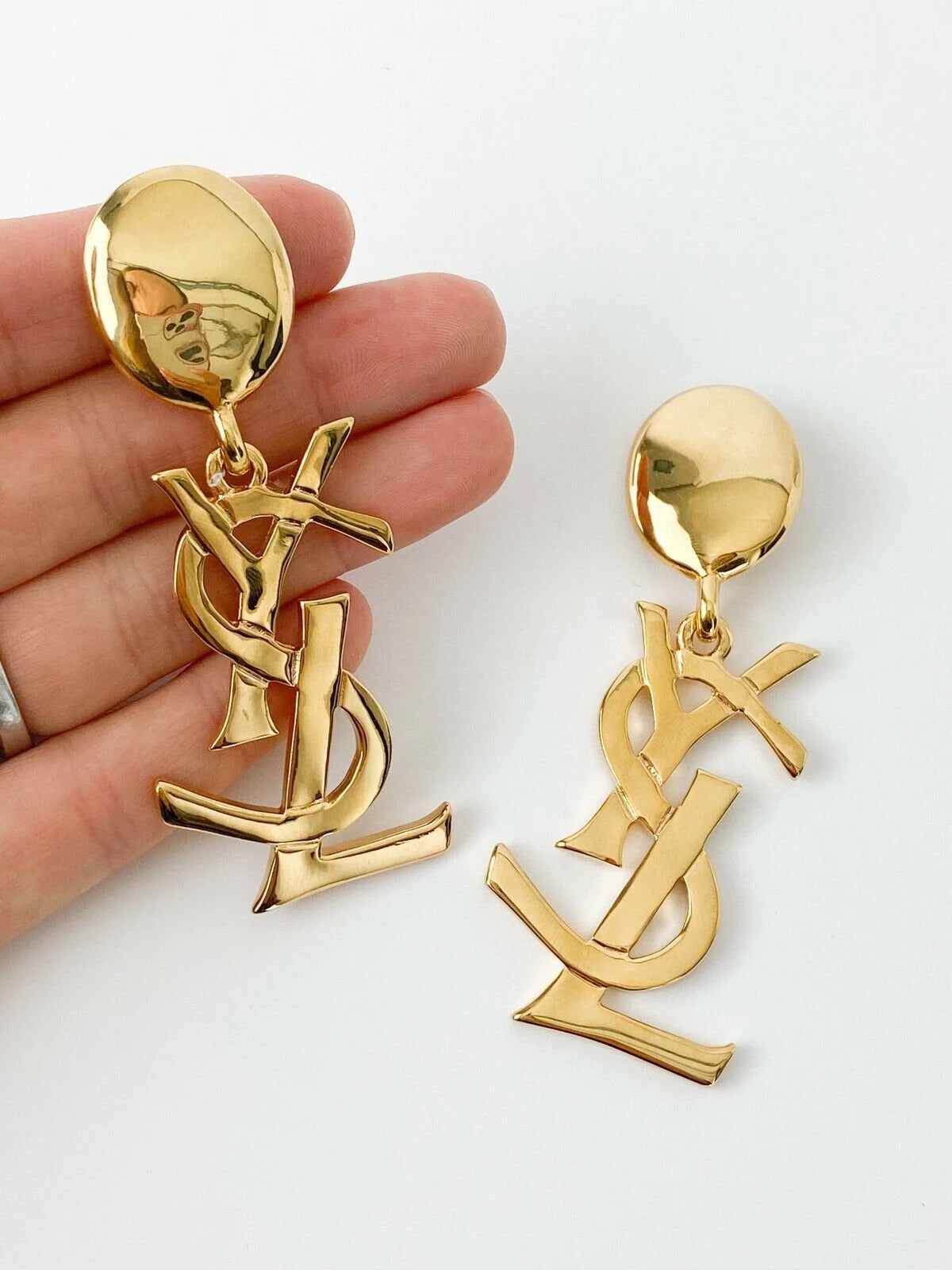 Authentic YSL Yves Saint Laurent vintage gold tone iconic logo drop earrings, made in France, extremely rare collector piece