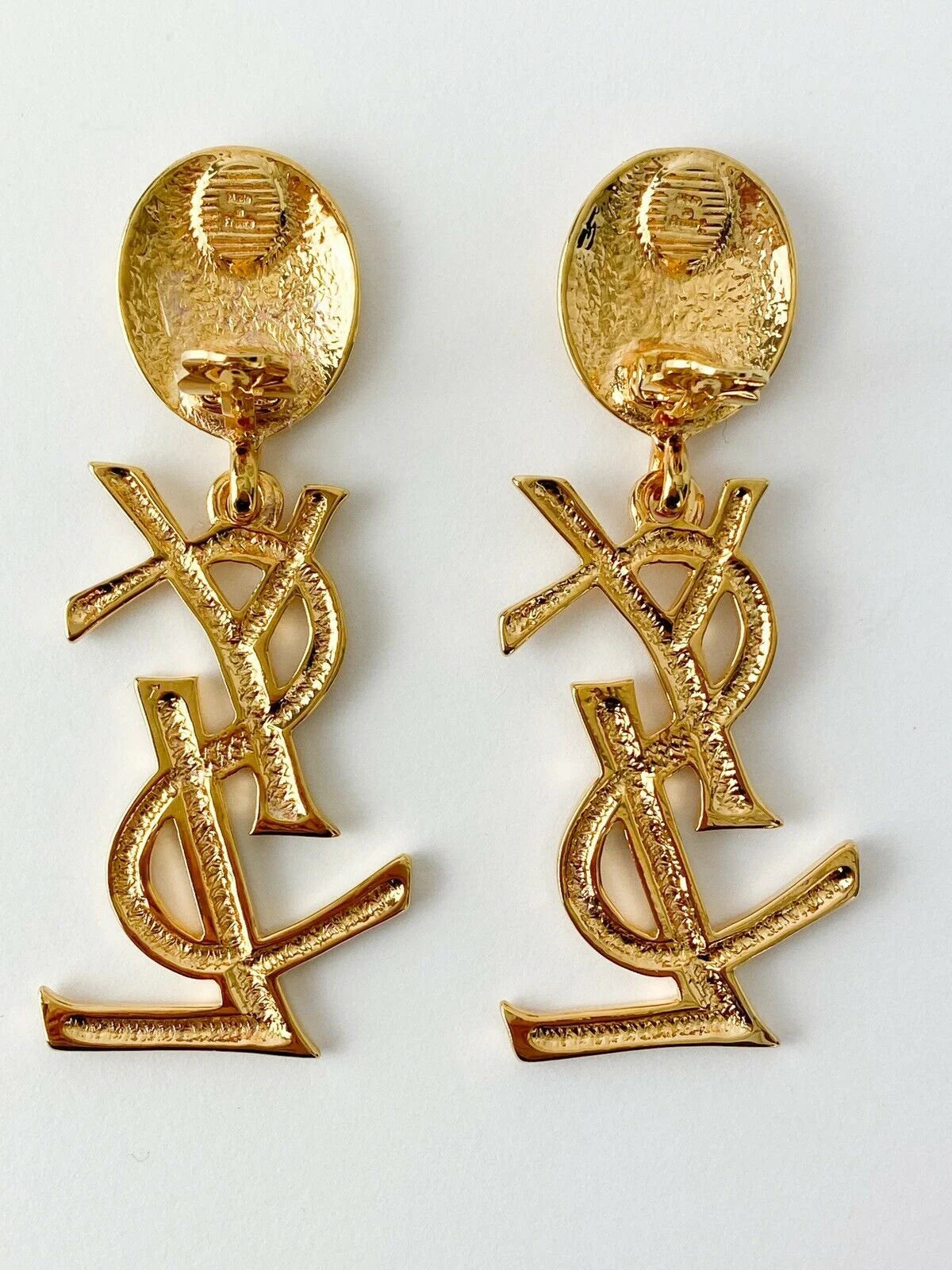Authentic YSL Yves Saint Laurent vintage gold tone iconic logo drop earrings, made in France, extremely rare collector piece