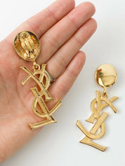Authentic YSL Yves Saint Laurent vintage gold tone iconic logo drop earrings, made in France, extremely rare collector piece
