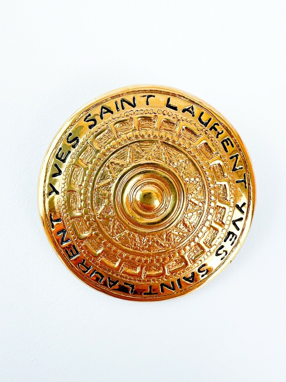 vintage Yves Saint Laurent medallion brooch