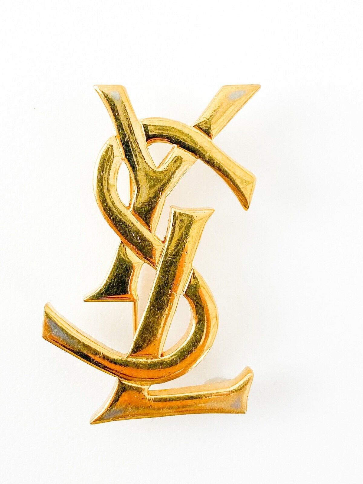 Vintage Yves Saint Laurent logo pin brooch 