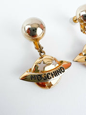 Moschino Vintage Star Saturn Planet Dangle Earrings Gold Tone Logo