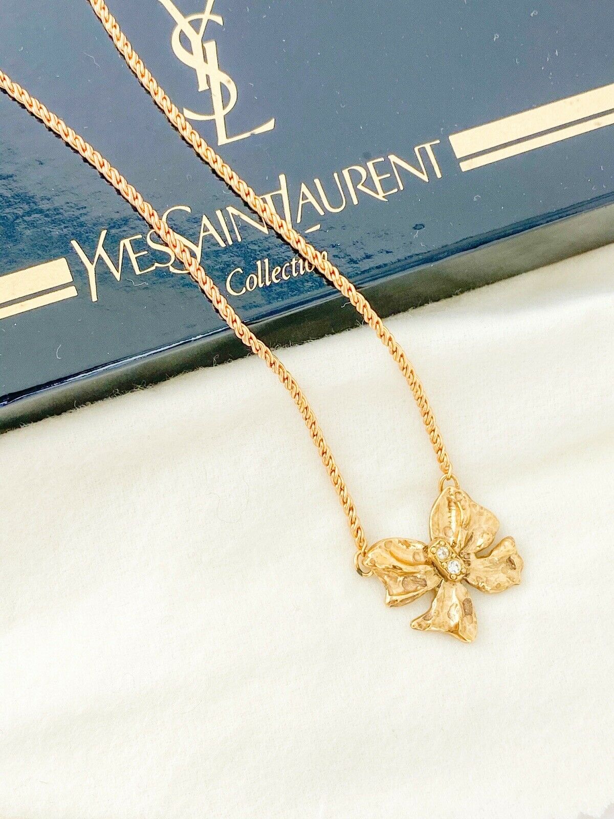 YSL Yves Saint Laurent Vintage Gold Tone Bow Ribbon Necklace Rhinestone