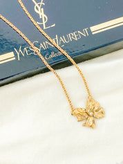 YSL Yves Saint Laurent Vintage Gold Tone Bow Ribbon Necklace Rhinestone