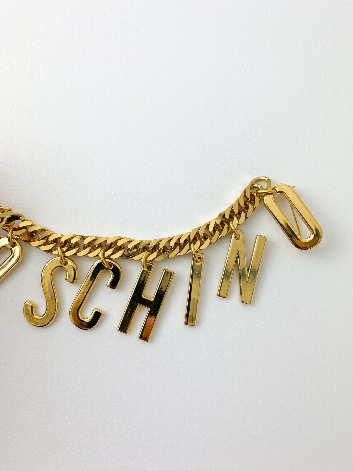 【SOLD OUT】Moschino Vintage Gold Tone Chain Logo Drop Brooch Pin