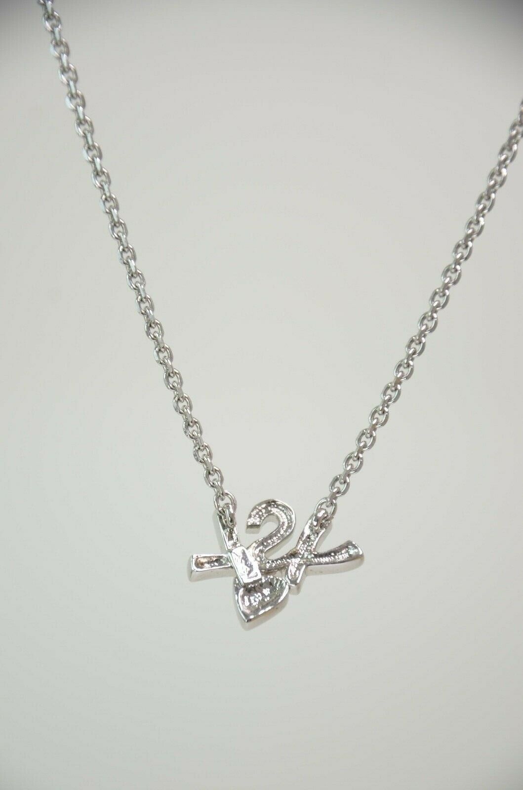 YSL Yves Saint Laurent Silver Tone Logo Heart Rhinestone Pendant Necklace Vintage