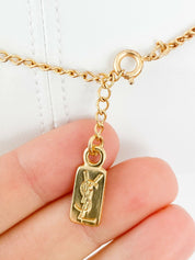 YSL Yves Saint Laurent Vintage Gold Tone Bow Ribbon Necklace Rhinestone