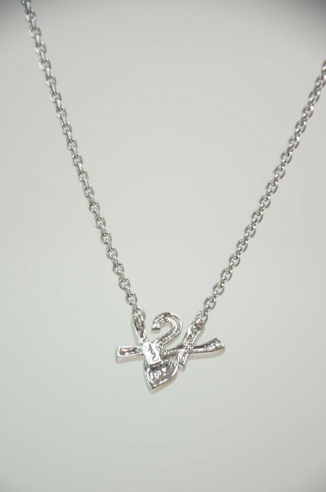 Ysl logo pendant on sale necklace