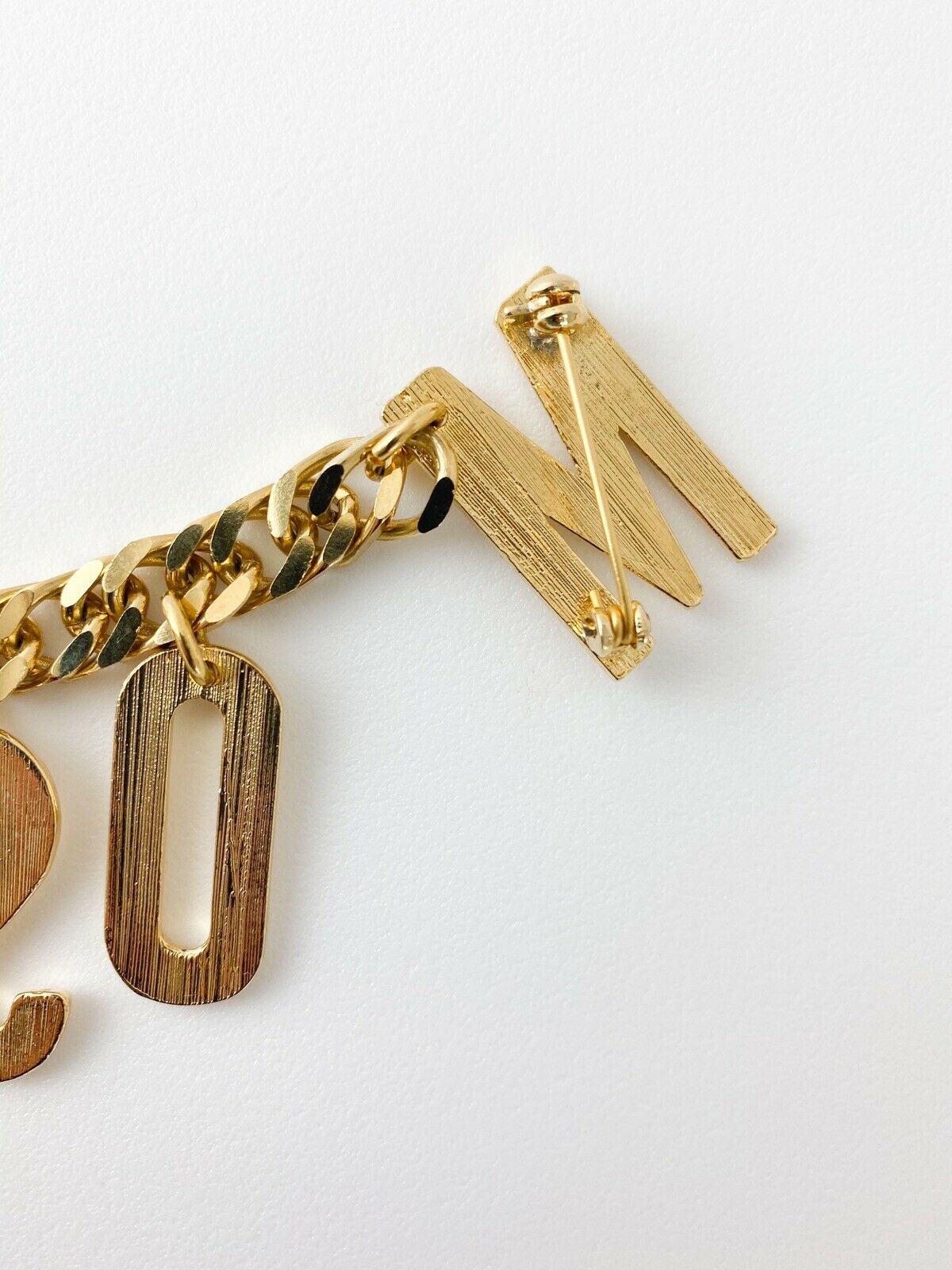 【SOLD OUT】Moschino Vintage Gold Tone Chain Logo Drop Brooch Pin