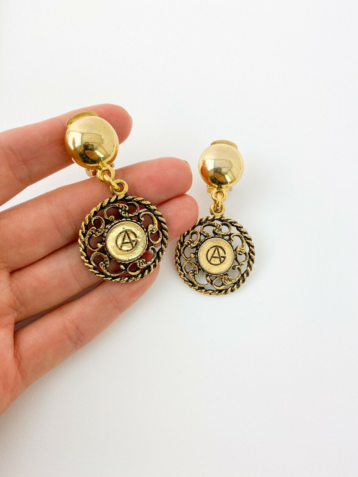 GIORGIO ARMANI Vintage Gold Tone Dangling Logo Medallion Earrings