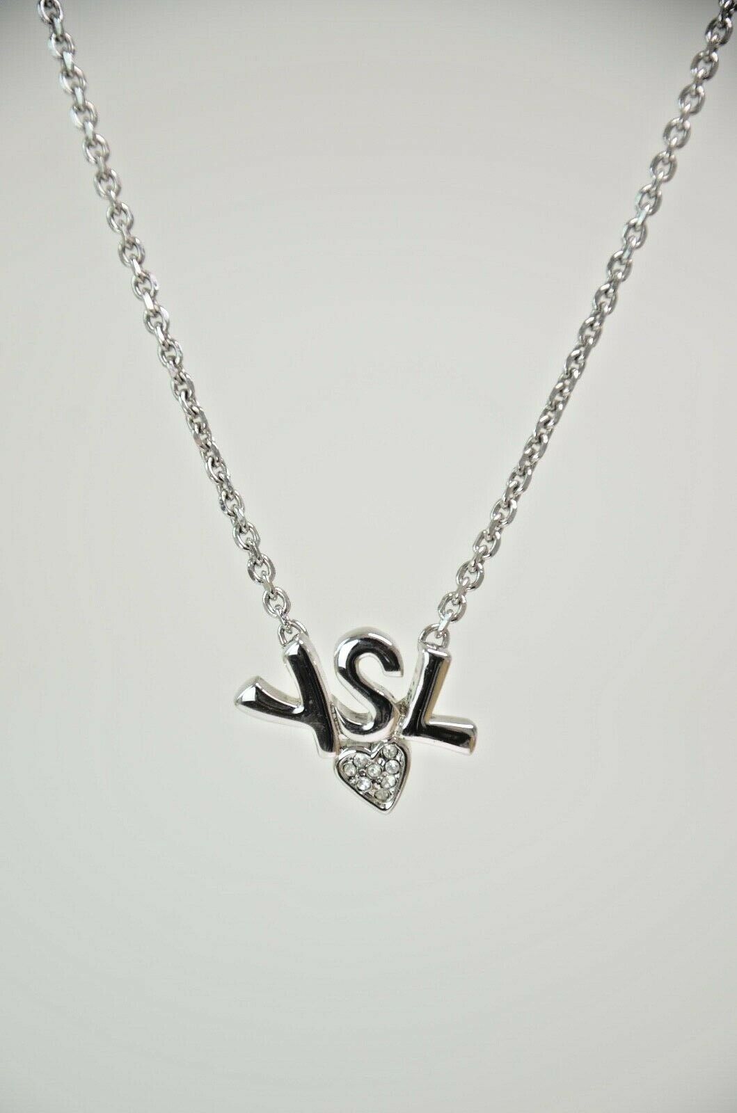 YSL Yves Saint Laurent Silver Tone Logo Heart Rhinestone Pendant Necklace Vintage