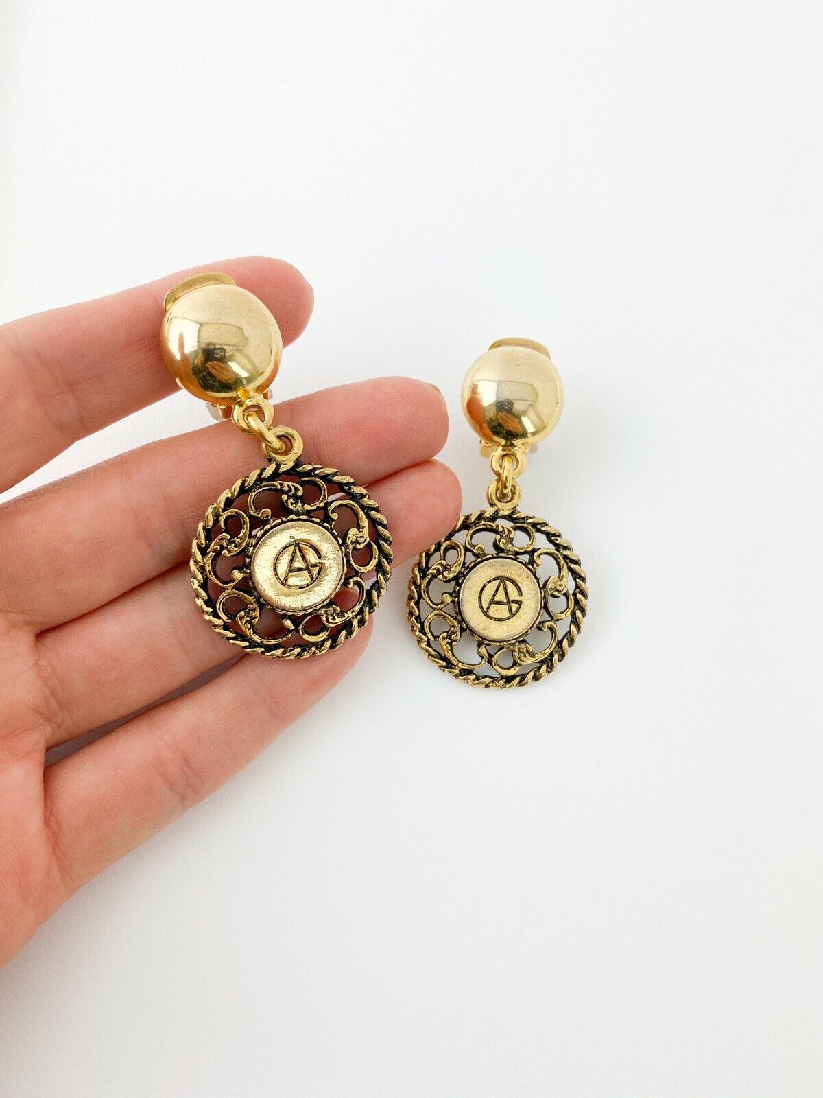 GIORGIO ARMANI Vintage Gold Tone Dangling Logo Medallion Earrings